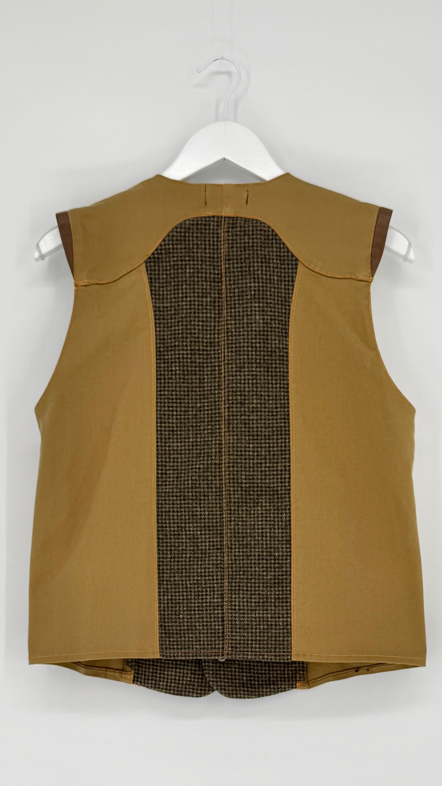 back of Brown vest with checkered pattern on a white background