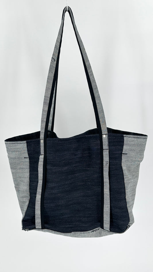 Black and gray tote bag on a white background
