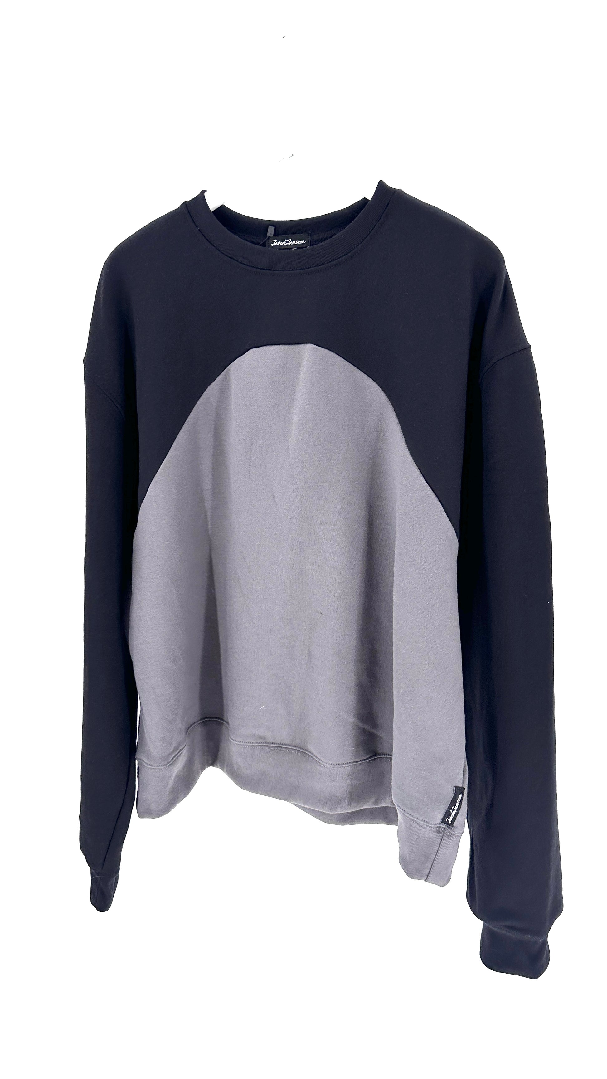 Sweatshirt with black and gray color block design on a white background