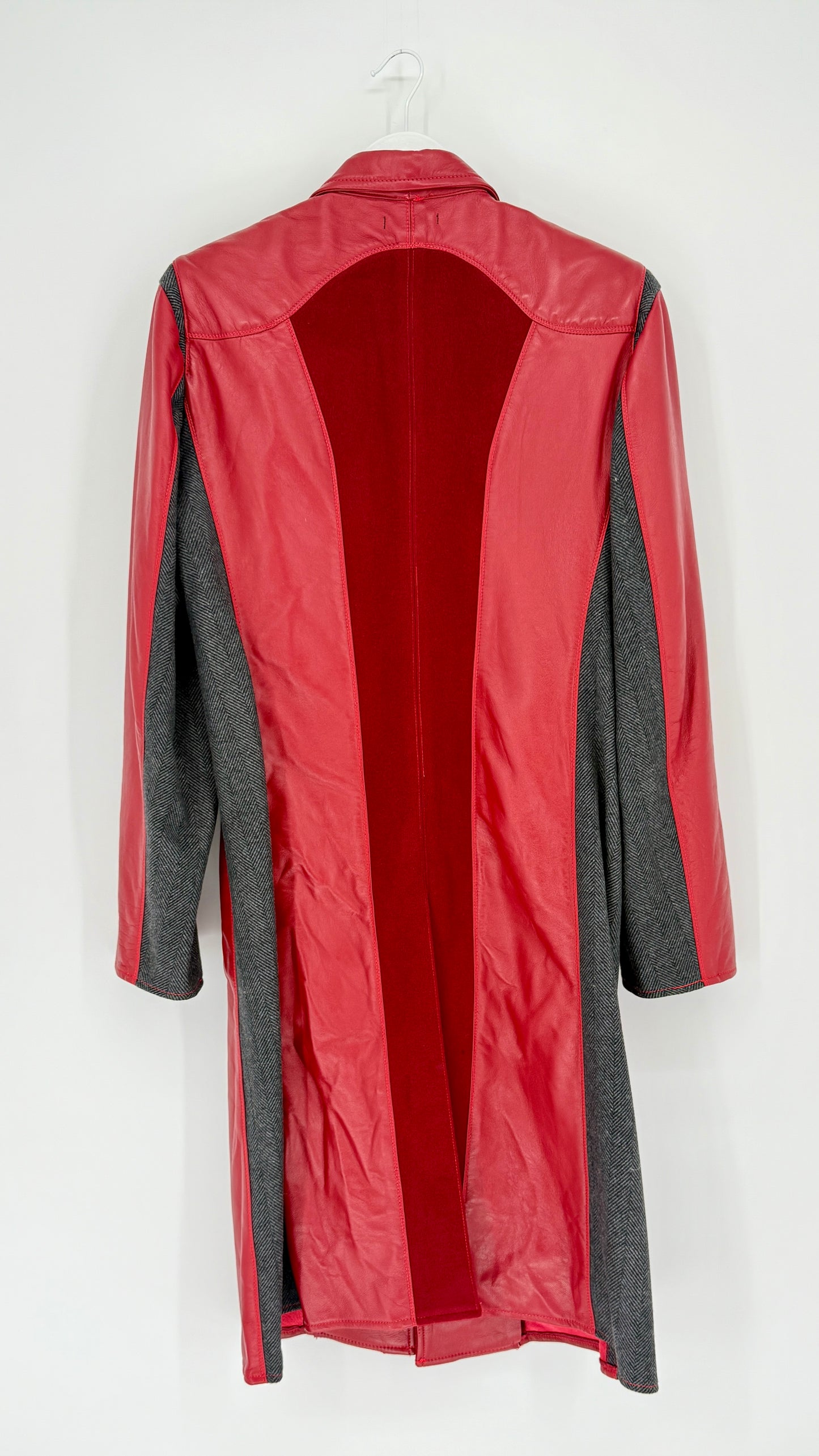 Red raincoat with gray accents on a white background