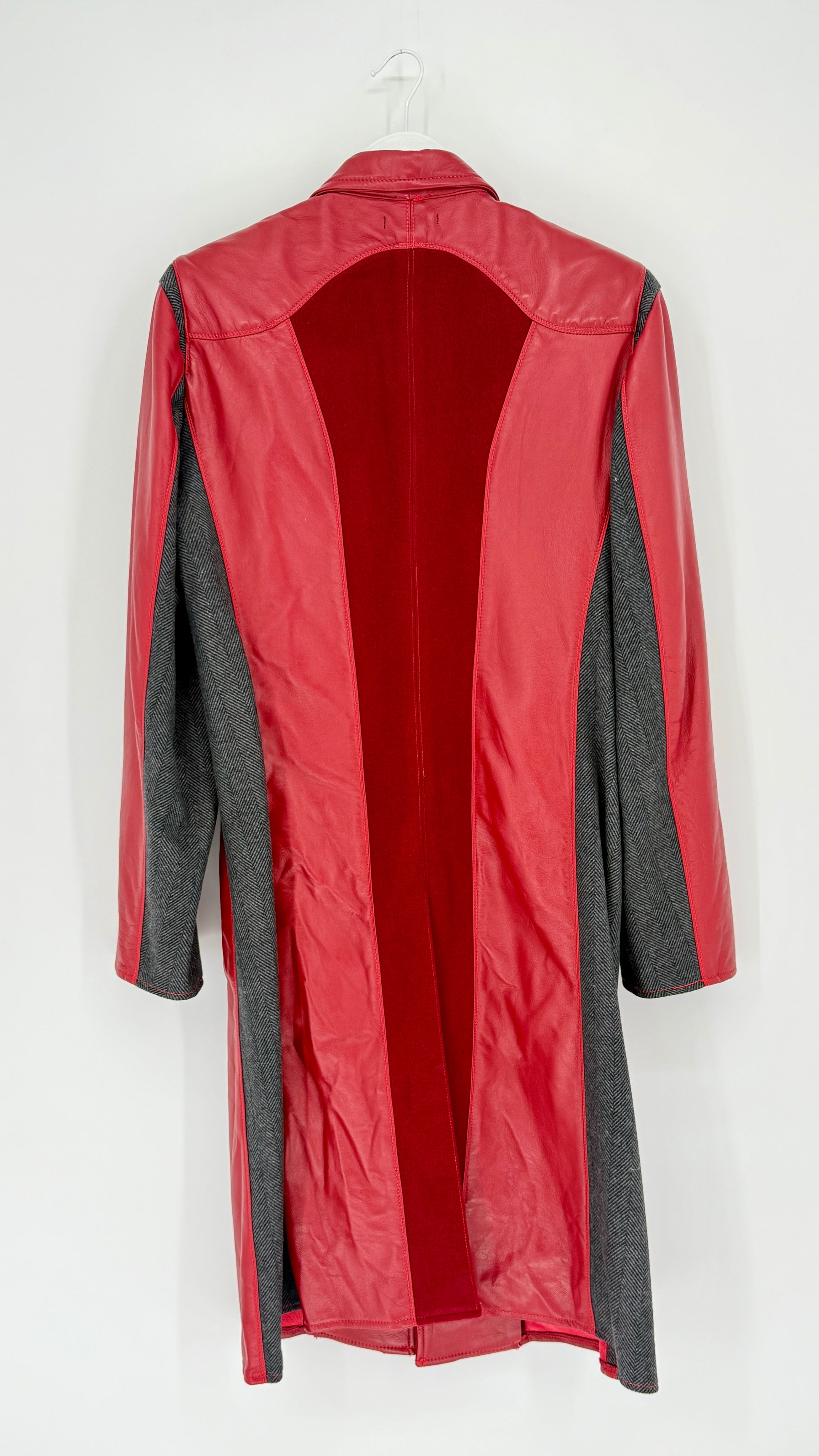 Red raincoat with gray accents on a white background
