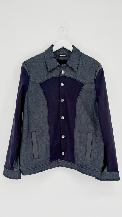 Two-tone jacket with dark blue and gray sections on a white background